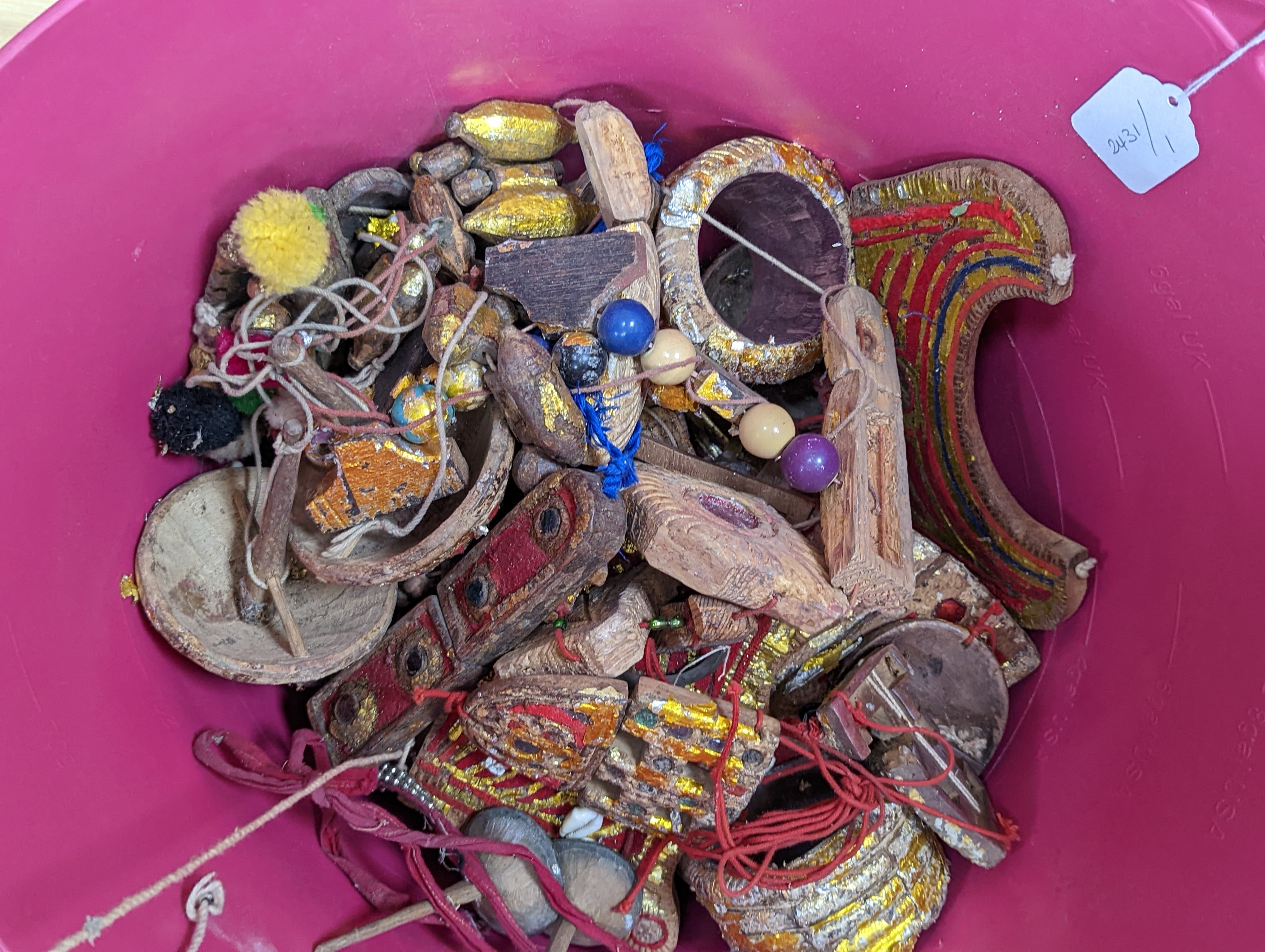 A group of Indian ornate wooden headdresses, masks etc